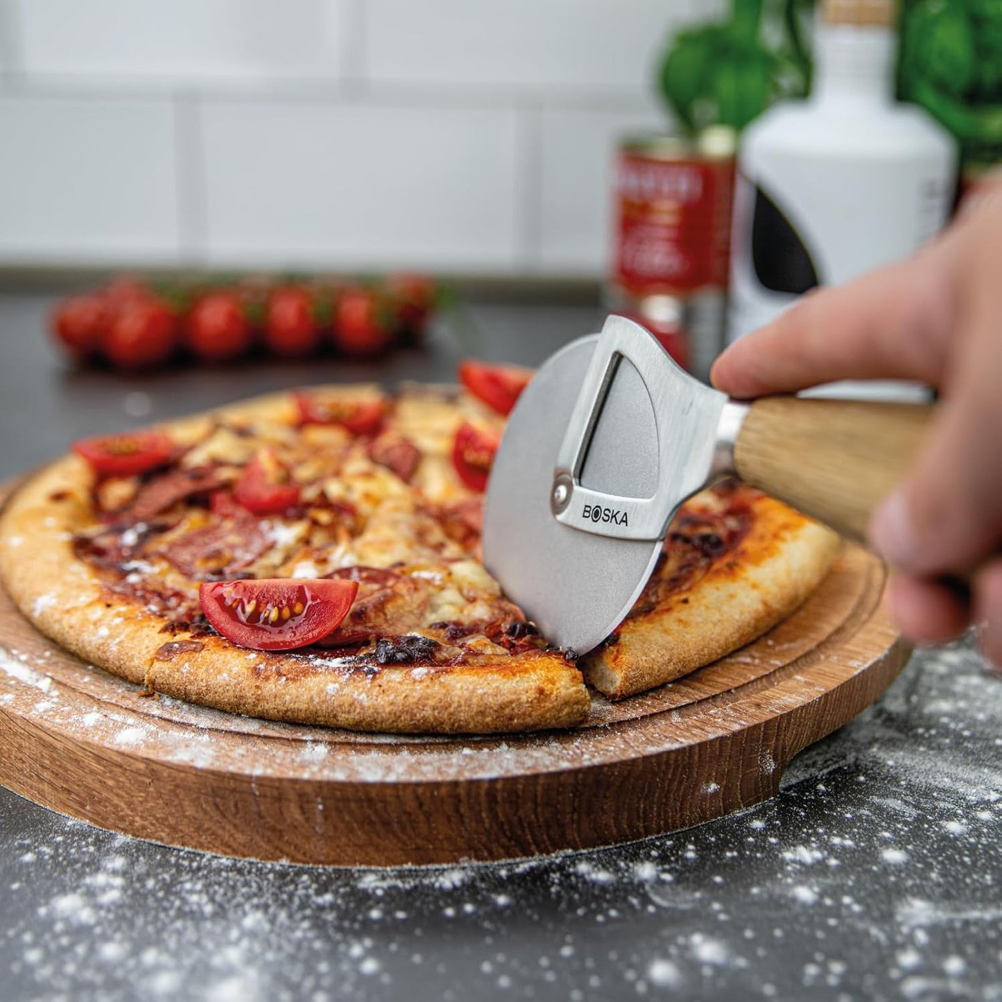 Boska Stainless Steel Pizza Cutter - Oslo Multifunctional Pizza Wheel Cutter - Handheld Food Slicer - Silver Non-Stick Roller - For Kitchen Cooking